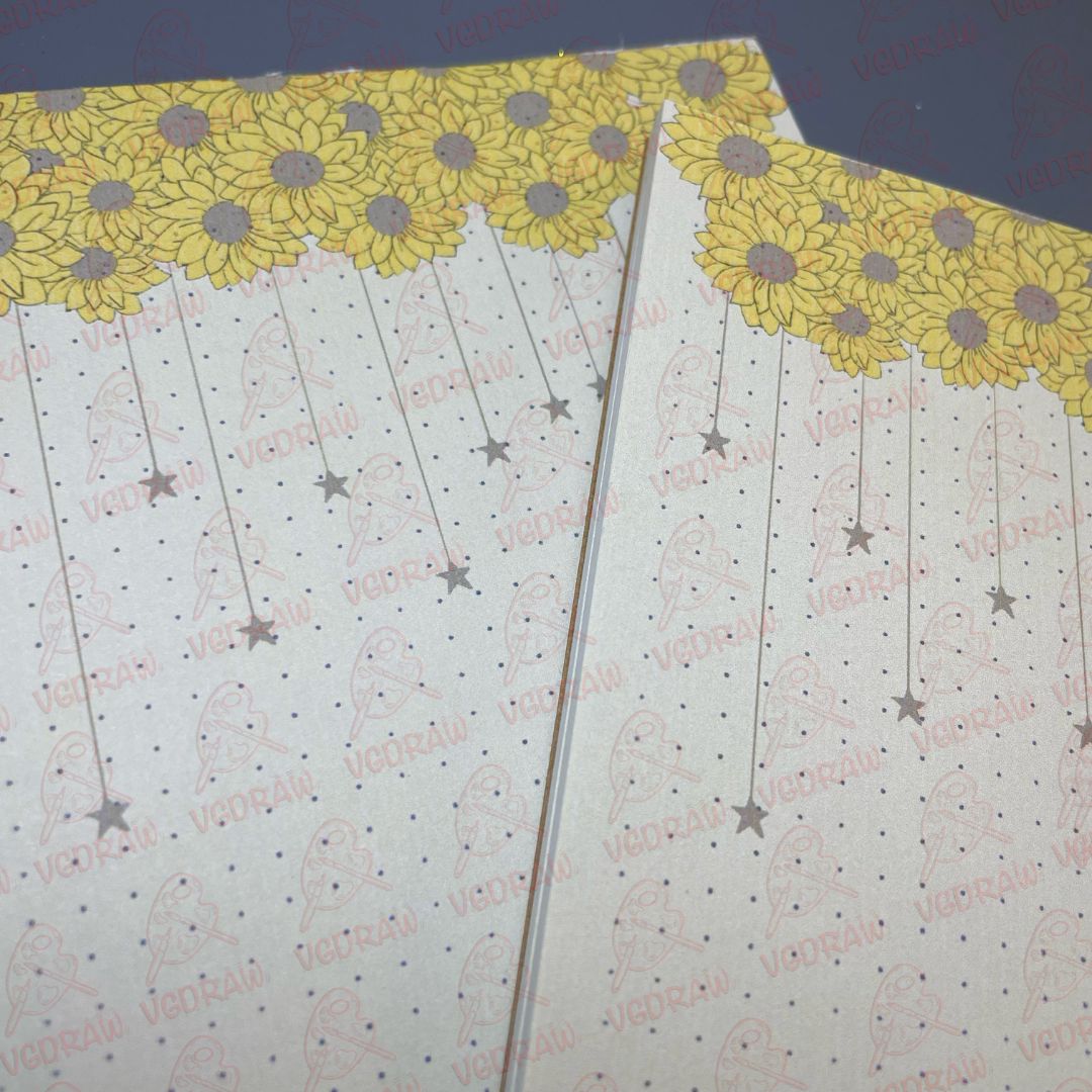Libreta de notas con forma de estrella de girasol