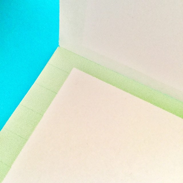 Bloc de notas desprendible con diseño navideño en colores pastel