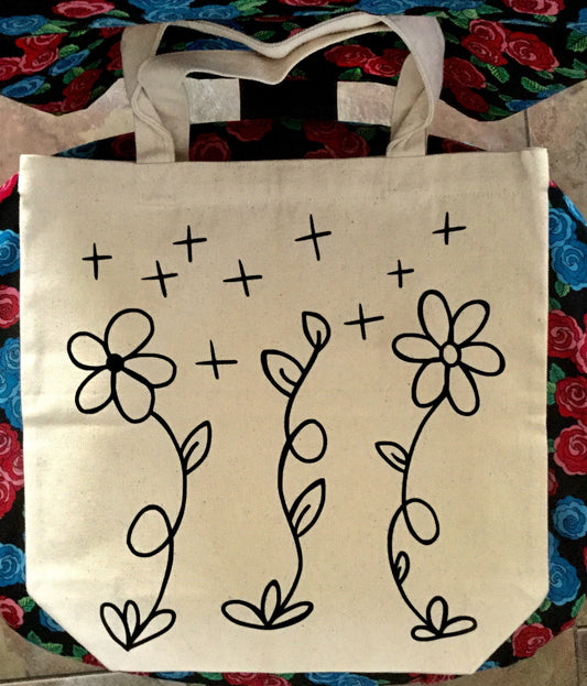 Bolso de mano con diseño de flores y garabatos